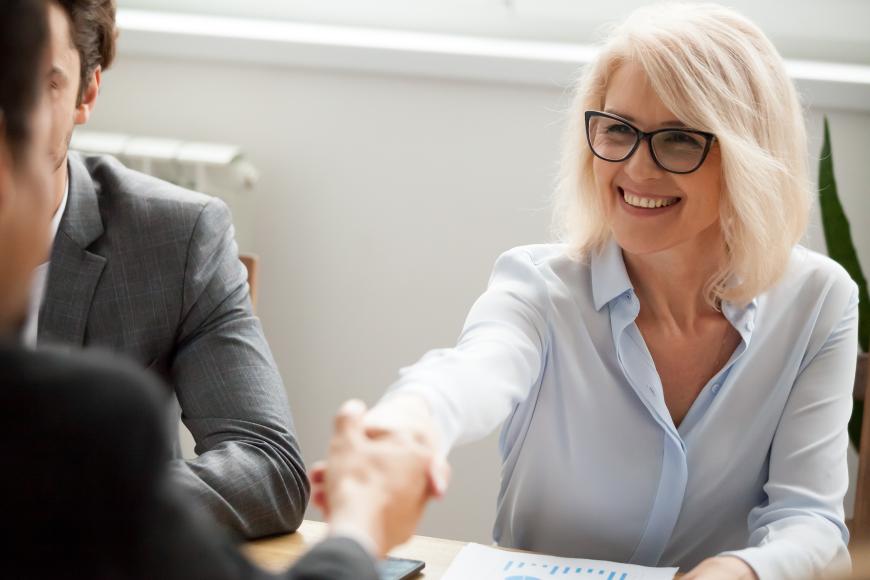 Woman man shaking hands